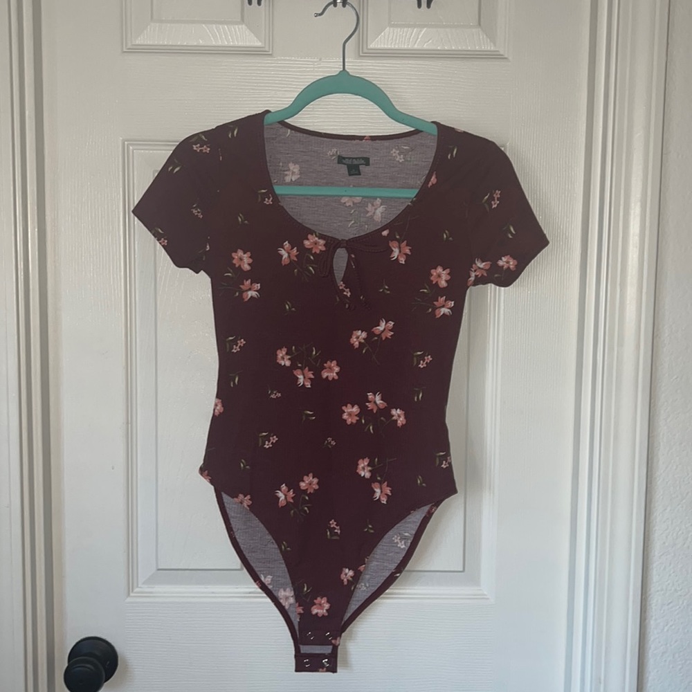 Never worn. Maroon Wild Fable bodysuit from target.